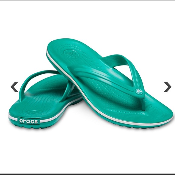 teal green crocs